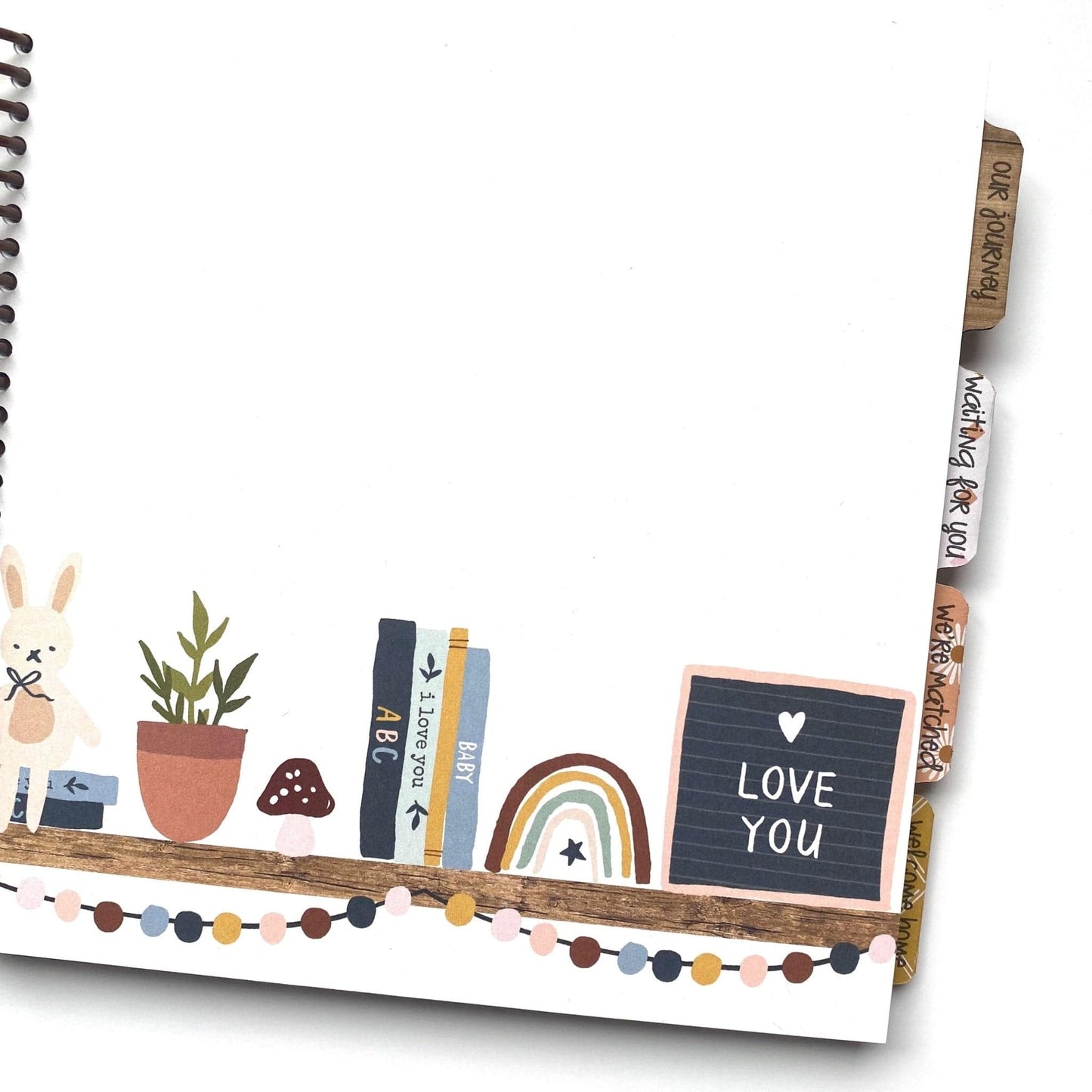 adoption journal lifebook with white cover and woodland nursery animals on cover