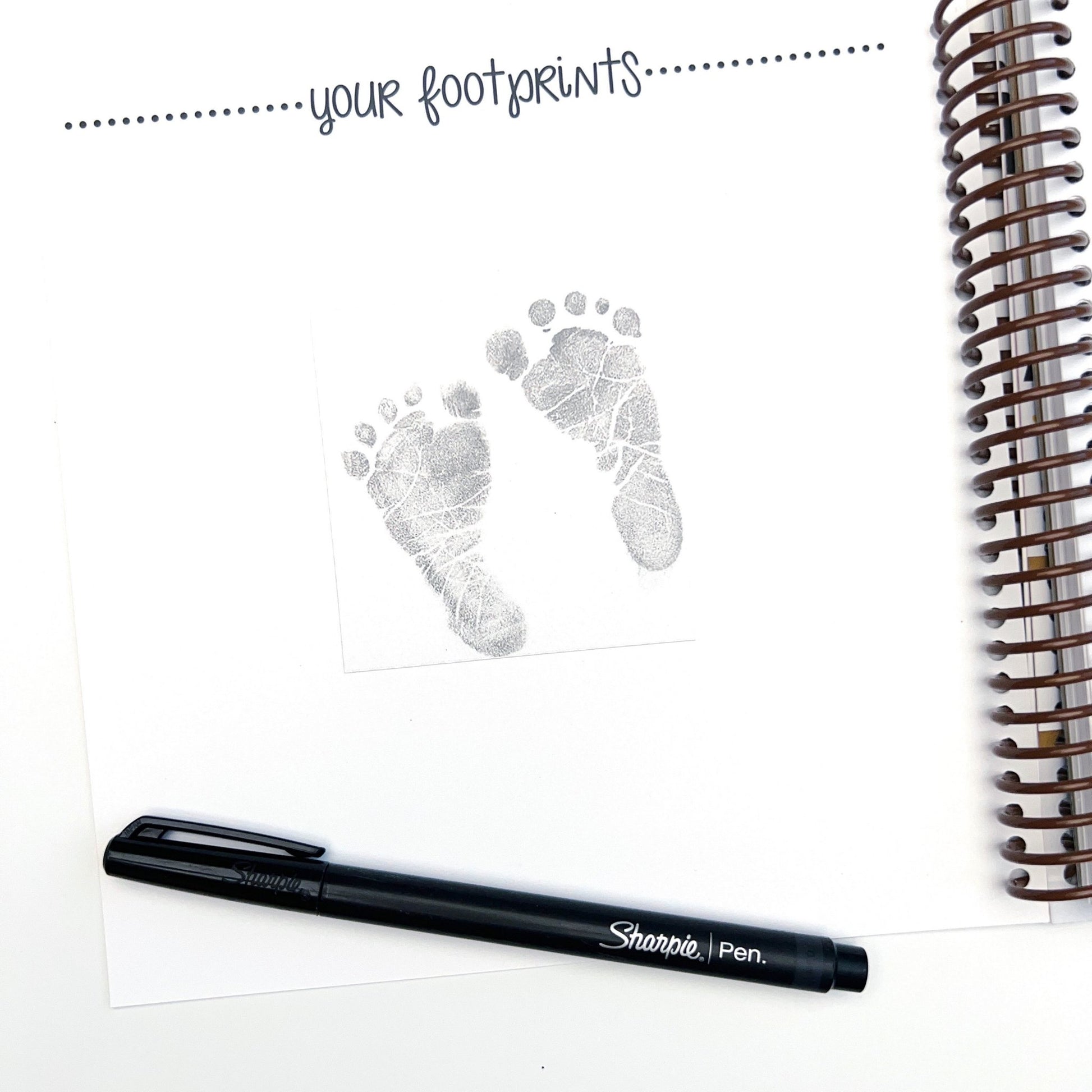 Page to place babys footprints. Make sure you bring this in your hospital bag so you can get babys prints in the book.